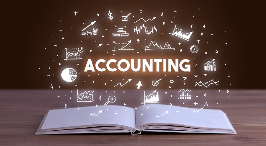 Accounting concept illustration with financial charts and business icons emerging from an open book